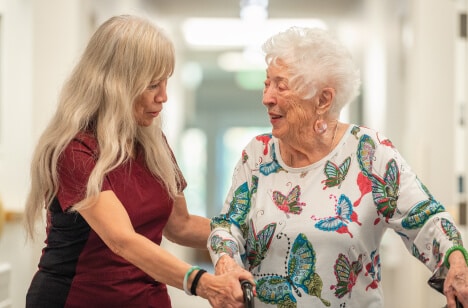 nurse speaking with resident
