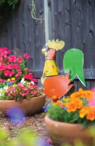 Chicken sculpture in garden