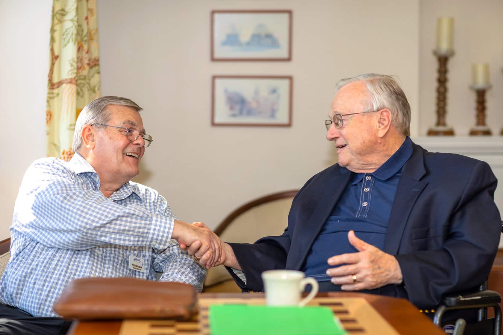 board members shaking hands